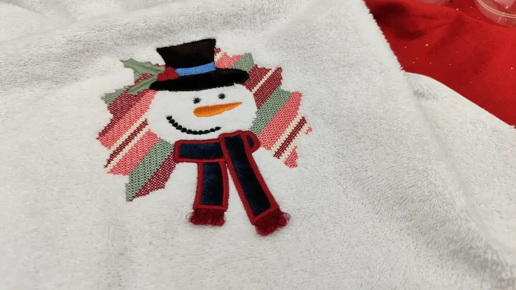 Creating an Embossed Snowman on Towels with Cross Stitch 3D Fringe 1